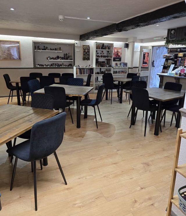 A party room set out with tables and chairs